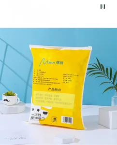 Detail of disposable pet bath towel packaging showing 60x120cm size and material
