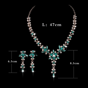 Detail view of emerald crystal bridal jewelry set with dimensions for necklace and earrings