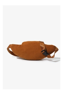 Detail of tan corduroy crossbody bag showing ribbed texture and black buckle strap