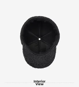 Inside view of men's winter leather hat featuring thick warm fleece and stitching
