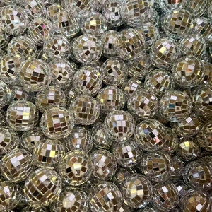 Silver mirror disco balls in various sizes with reflective glass tiles for party decor