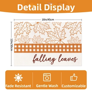 Detail of fall maple leaves placemat showing 18x12 inch size and durable texture