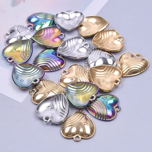 Textured stainless steel heart charms in gold, silver, and rainbow for DIY jewelry