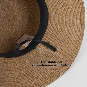Detail of adjustable velcro strap and sweatband inside the paper straw sun hat