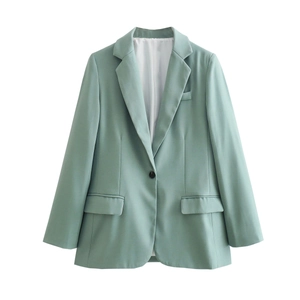 Flat lay of a stylish light green women's blazer with one button and notch lapels
