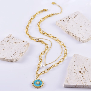 Double-layer gold stainless steel necklace with turquoise sun pendant and pearls