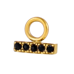 Macro detail of gold bar pendant with five black faceted gemstones for jewelry DIY