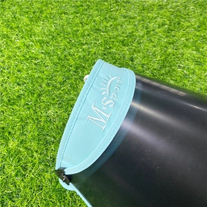 Close-up detail of outdoor sun visor hat with blue band and black shield
