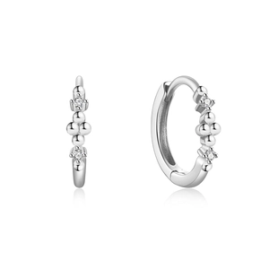 Detail showing S925 silver hoop earrings with micro-set diamonds and metal beads