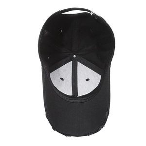 Vintage black distressed baseball cap with ripped brim and six-panel cotton structure