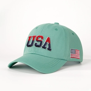 Detail of USA 3D embroidery and flag patch on mint green cotton baseball cap