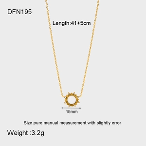 Detail showing 18K gold plated sun pendant necklace with opal stone and size markers