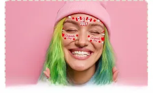 Close-up of Canada Day face tattoos featuring red maple leaf and 1 July flag designs