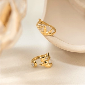 18K gold plated stainless steel bird ring with white zircon in a minimalist design