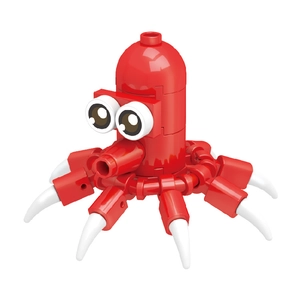 Close-up of red octopus building blocks toy with large round eyes on white background