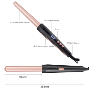 Close-up of 5-in-1 curling iron with LCD display, gold handle and 360-degree swivel cord