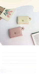 Pink and beige compact women's bow wallet with detailed interior card slots and size info