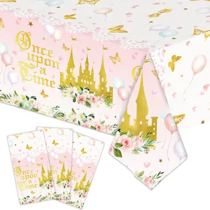Close-up of pink princess castle party tablecloth with Once Upon a Time floral design