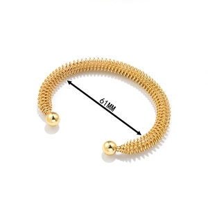 Minimalist 18K gold plated stainless steel spring cuff bracelet with 61mm diameter
