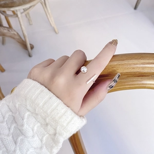 Minimalist S925 sterling silver open ring featuring a smooth bead and bar design on model