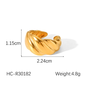 Macro detail of gold croissant ring showing dimensions 1.15cm width and 2.24cm diameter