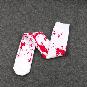 Detail of white Halloween knee-high socks with realistic red blood splatter print design