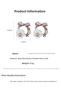 Detail view of heart-shaped stud earrings with pink shells and pearls, 1.4cm x 1.3cm