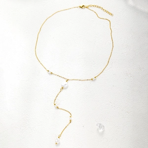 Elegant gold plated stainless steel Y-shaped necklace with white pearls and tassel design