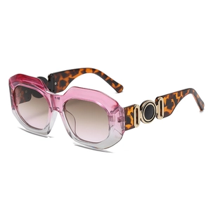 Retro oversized sunglasses with pink gradient frames, tortoiseshell temples and gold rings