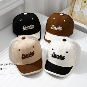 Mesh baby baseball caps with Lucky embroidery in various earth-tone color combinations