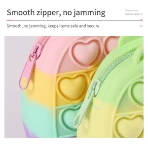 Rainbow silicone pop-it coin purse with smooth zipper closure and heart bubbles