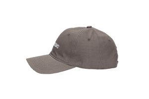 Close-up of side white BASIC embroidery on dark brown cotton baseball cap