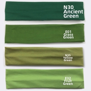Detailed comparison of elastic knitted headbands in four different shades of green fabrics