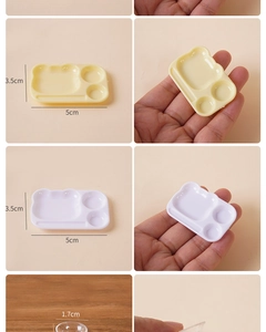 Detailed view of miniature bear-shaped plates and small bowls for dollhouse kitchen sets