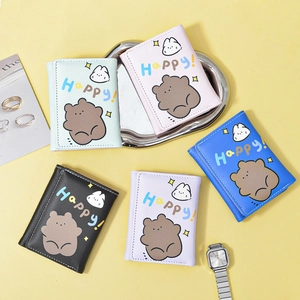 Cute cartoon bear tri-fold wallets in five colors on a trendy ginger yellow background