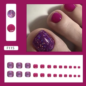 Macro detail of glossy magenta and purple glitter press-on toenails set model F115