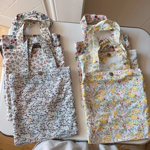 Set of floral cotton tote bags with metal snaps in various patterns and colors
