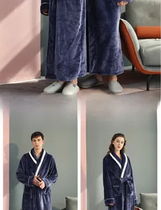 Detail of navy thick flannel bathrobe featuring contrast white piping on cuffs and collar