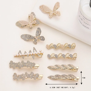 Set di eleganti fermagli per capelli dorati con perle bianche e strass geometrici vari