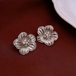 Elegant silver 18k gold plated flower stud earrings with sparkling cubic zirconia crystals