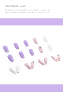 Detail of medium long coffin nails with purple wavy patterns and solid white colors