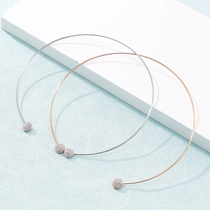 Minimalist open collar necklace in gold and silver finish with sparkling rhinestone ends