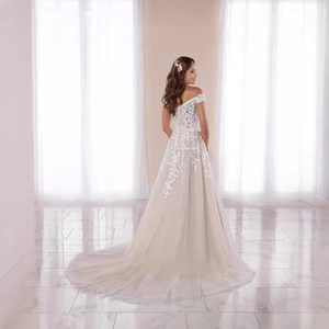 Elegant off-shoulder ivory wedding dress with floral lace embroidery and tulle train