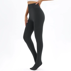 Detail of high waist slimming fit thermal leggings in matte dark grey for winter