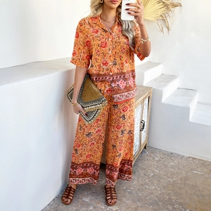 Ensemble bohème à imprimé floral orange avec chemise à manches courtes et pantalon large