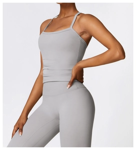 Close-up of grey brushed fitness set featuring slim strap top and high-waisted leggings
