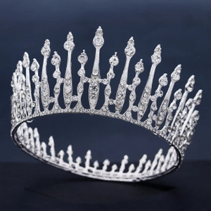 Macro shot of silver rhinestone crown with vertical crystal spikes for weddings