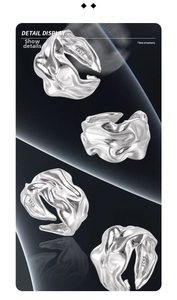 Detail display of S925 sterling silver ring showing irregular lava texture and open band