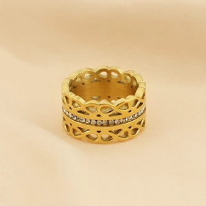 Macro shot of gold hollow infinity ring featuring two rows of inlaid zircon crystals