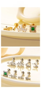 Detailed display of G23 titanium flat back studs featuring zircon heart and crown designs